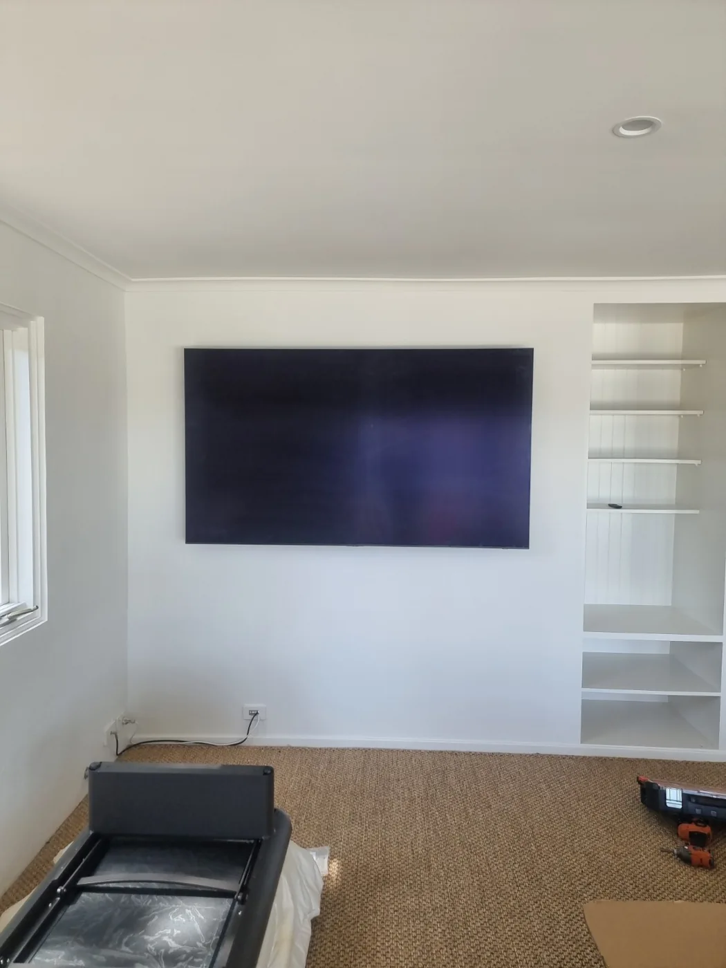 Living-room wall after TV installation