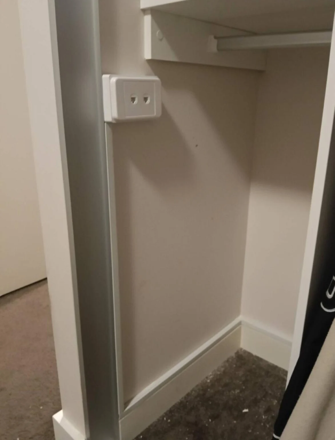 The cabinet space before equipment was installed.