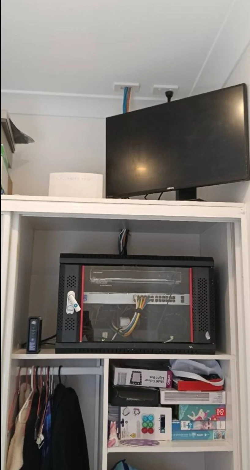 A rack and equipment installation inside cabinetry.