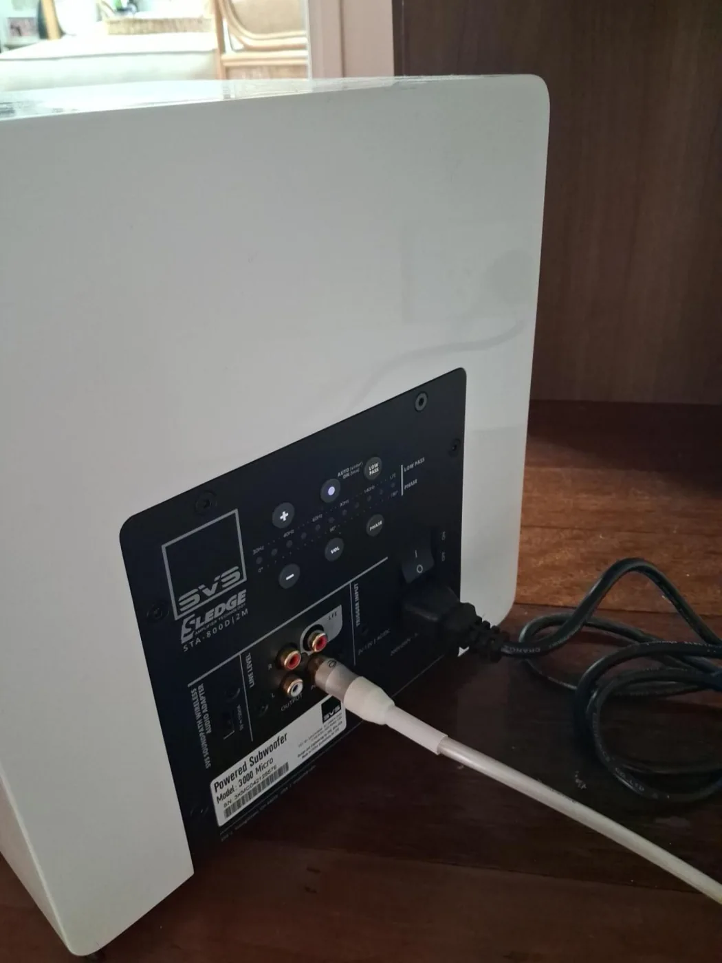 Rear-panel connections on a powered subwoofer.