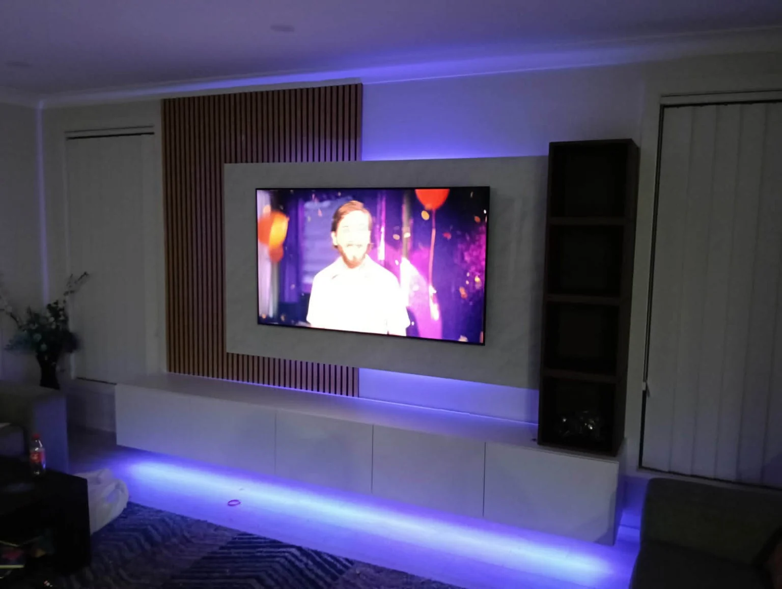 The completed entertainment space with its accent lighting on.