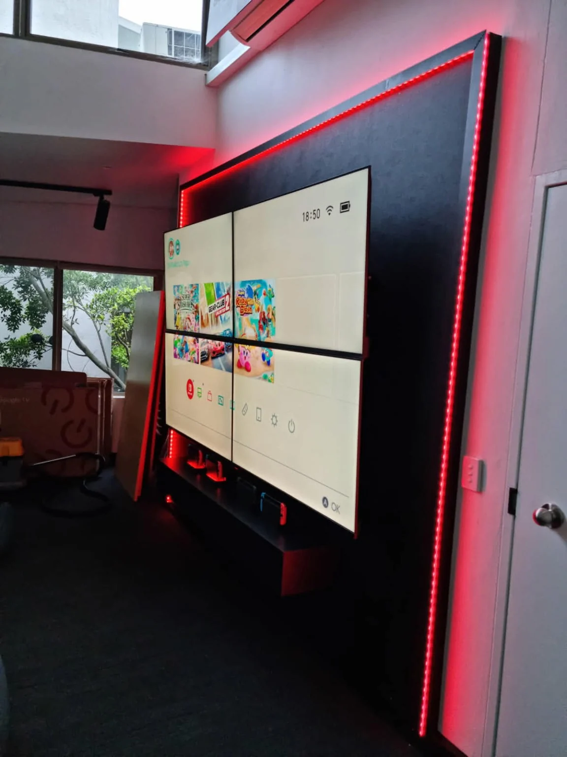 A side view of the screen wall and its red accent lighting.