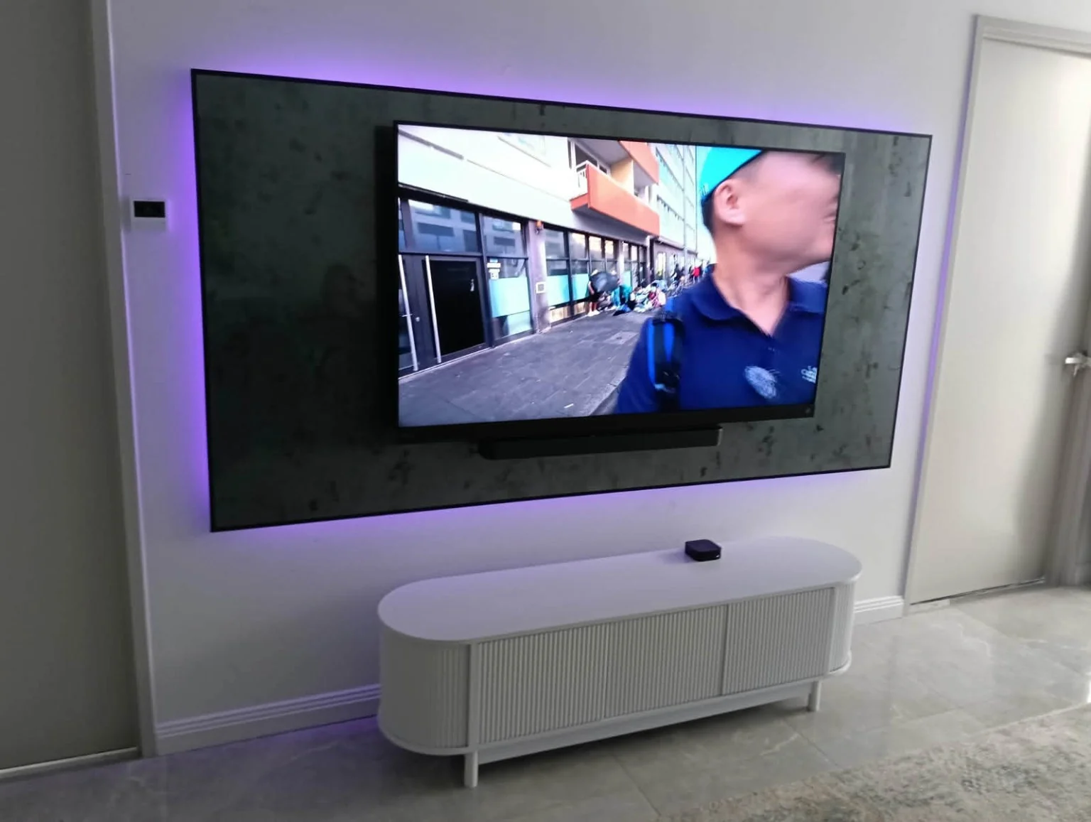 The screen and media unit in the finished room.